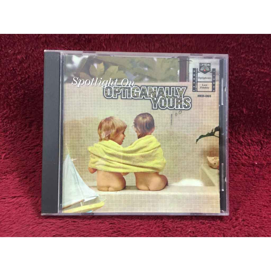 CD Optiganally Yours – Spotlight On Optiganally Yours สภาพตามรูปปก EA109-121