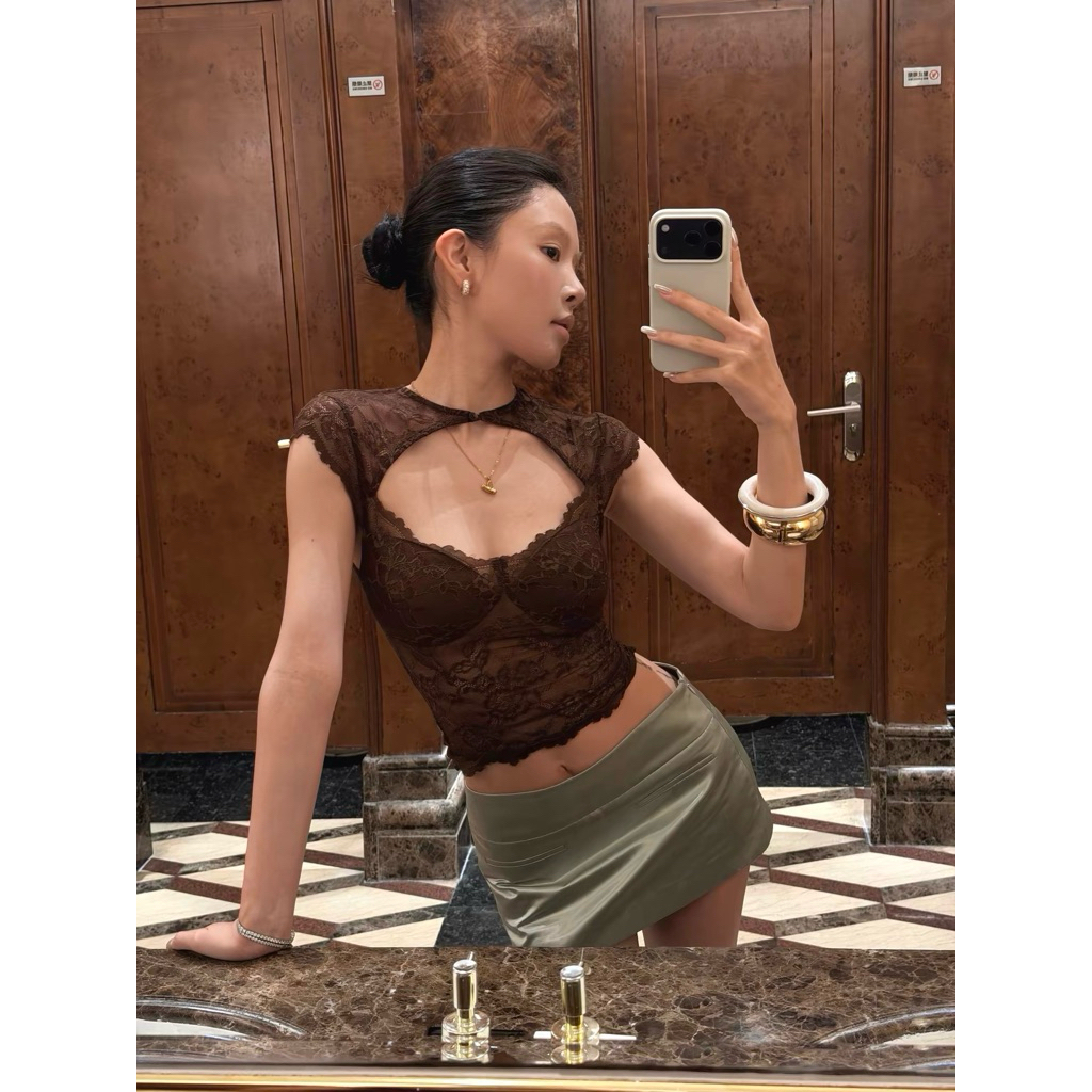 Hydrae, a slightly tipsy, retro-style lace T-shirt and skirt
