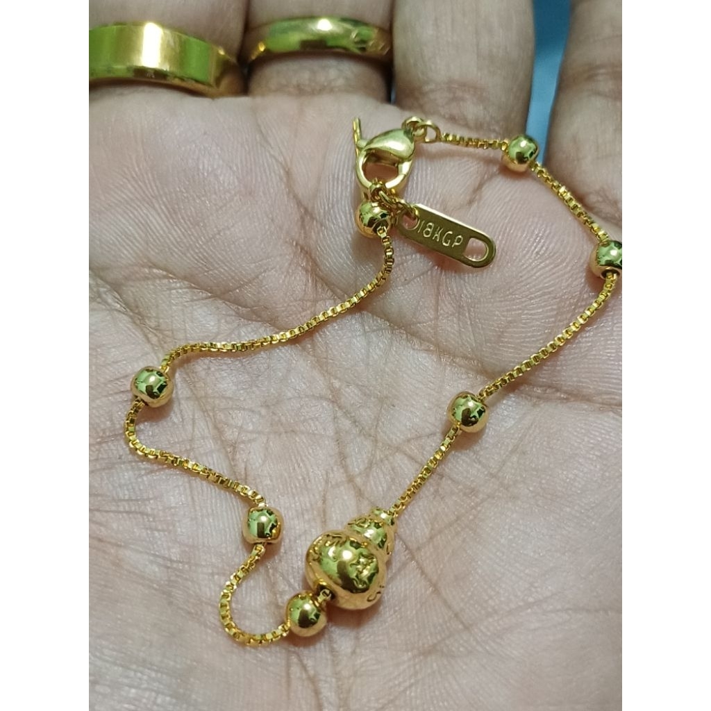 สร้อยข้อมือสีทองน้ำเต้าดูดทรัพย์ตอก18kคัดมือสองไม่มีตำหนิ
