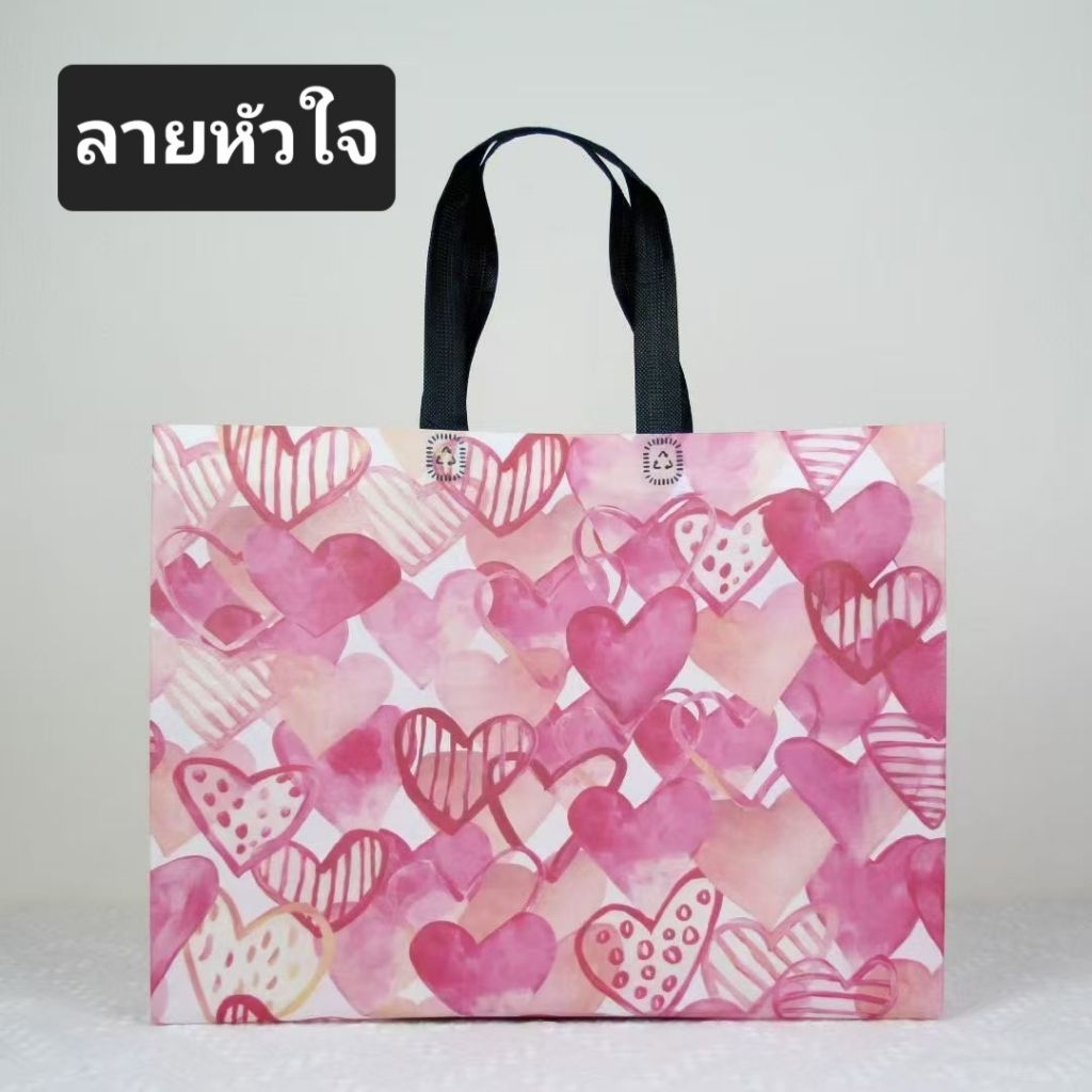 ถุงผ้าสปันบอนด์เคลือบลายขนาดกว้าง32สูง27ขยายข้างและก้น10ซม.200บาทมี20ใบ - รูปที่ 3