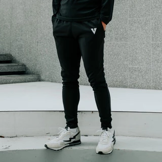VOLT กางเกงขายาวผู้ชาย รุ่น NEUTRON 001 ESSENTIALS สีดำ ผ้ายืด ระบายอากาศ สำหรับเทรนนิ่งและออกกำลังกาย