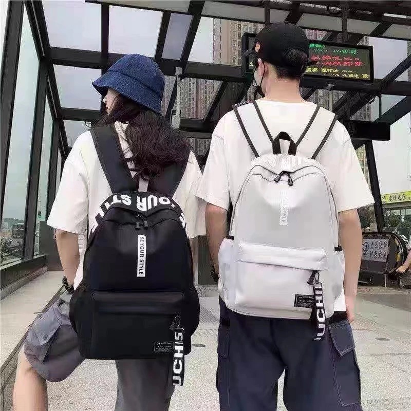 กระเป๋าสะพายหลัง ผ้ากันน้ำ กระเป๋าเป้สะพายหลังหญิง-ชายแฟชั่นสไตล์ ทนทาน  มี7 สี（ขนาด24*34*12ชม）