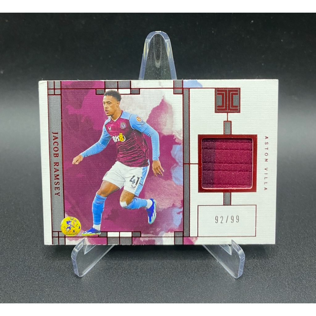 การ์ดฟุตบอล👕ชิ้นส่วนผ้า JACOB RAMSEY ASTON VILLA /99 2023-24 PANINI IMPECCABLE PREMIER LEAGUE SOCCER