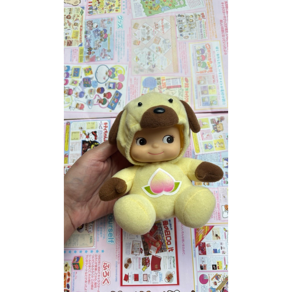 ตุ๊กตาคิวพี Kewpieใส่ชุด  ฮูดเหลือง Rose O'Neill Kewpie x Momotaro Plush สินค้าลิขสิทธิ์แท้จากญี่ปุ่