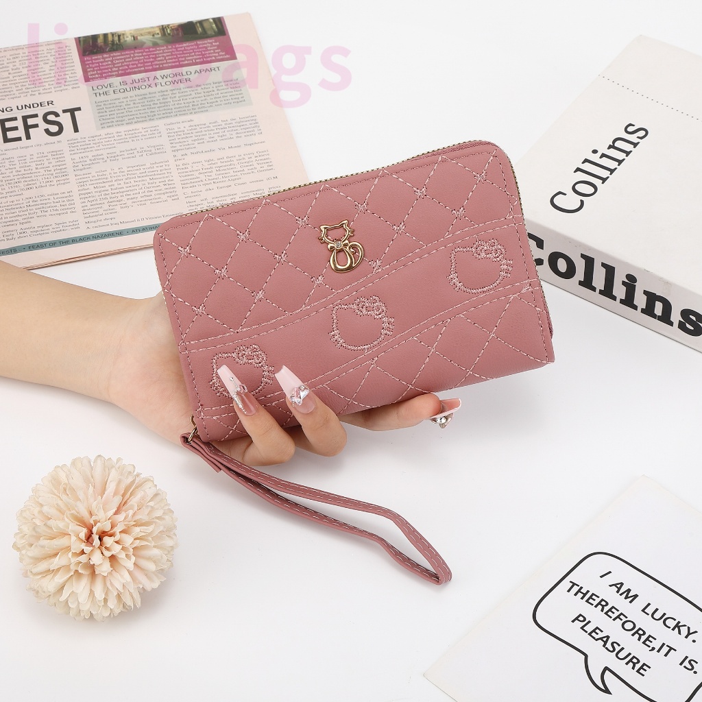 M21#กระเป๋าสตางค์1ซิปราคาถูก ใบกลางมีช่วงใส่บัตรงทั้งหมด4ช่อง. กระเป๋ายาว16CM รุ่นใหม่มีสายคล้องมือทุกใบค่ะ