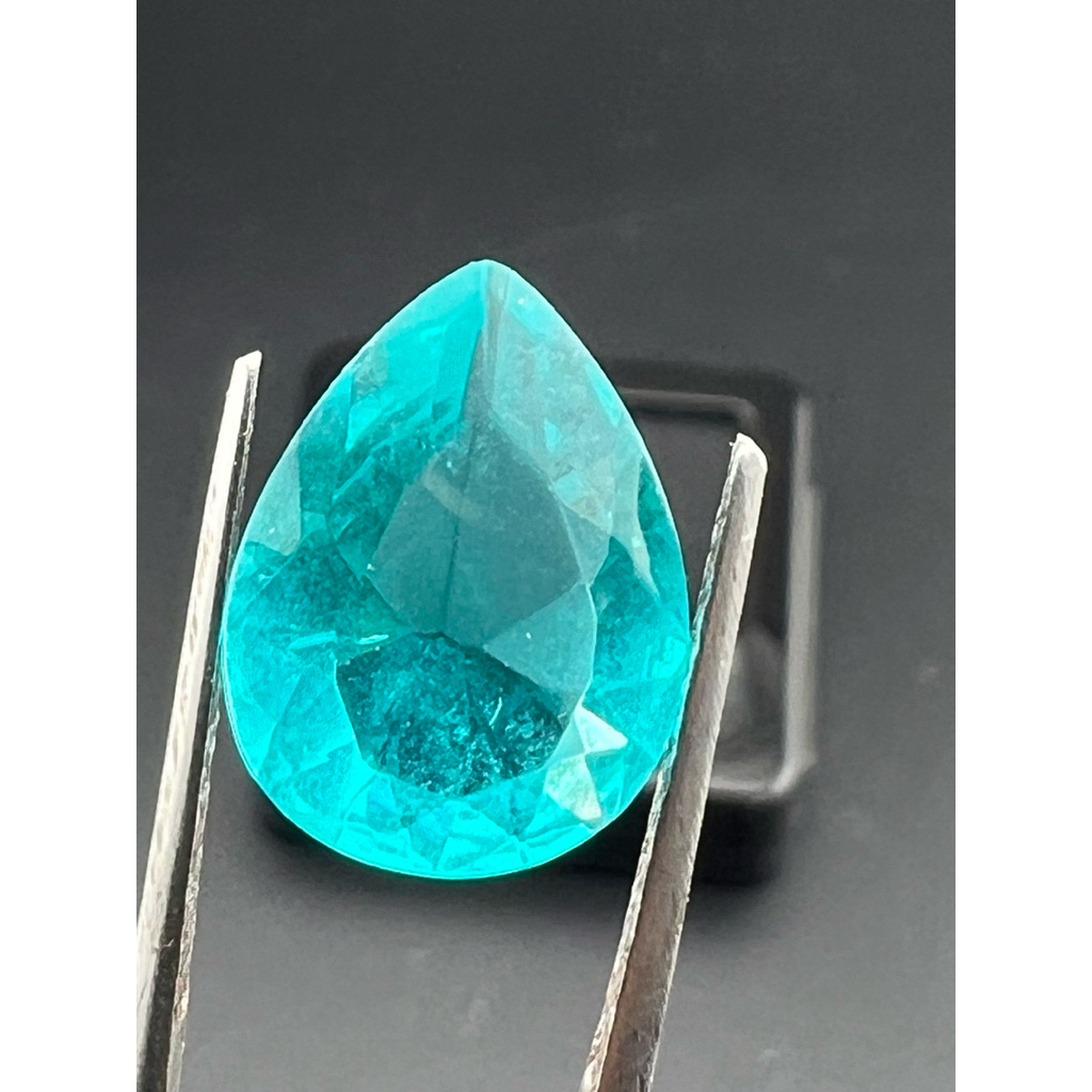 Lab Glass สี PARAIBA ขนาด 16x12 มิล กะรัต ( Lab GLASS PARAIBA ) พลอย LAB MADE 100%. ราคา เป็นเม็ด