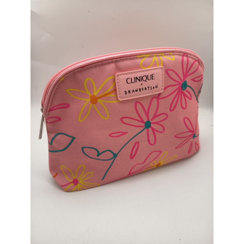 กระเป๋าเครื่องสำอางคลินิก CLINIQUE x DRAWBERTSON ผ้าสีชมพูพิมพ์ลายกราฟิกดอกไม้