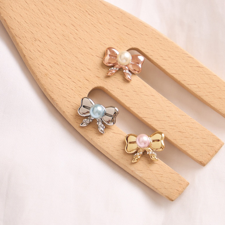 earika.earrings - bubbly bow ต่างหูโบว์ปลายเกลียว วัสดุสแตนเลส (stainless steel)