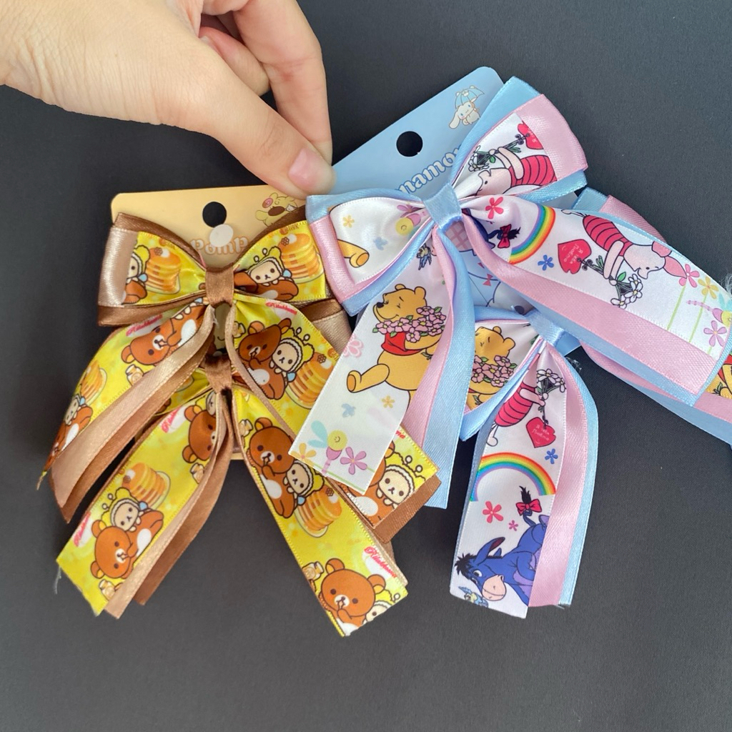 (14) กิ๊บโบว์ 2 ชั้น คู่ละ 35 บาท (1 คู่ = 2 ชิ้น)