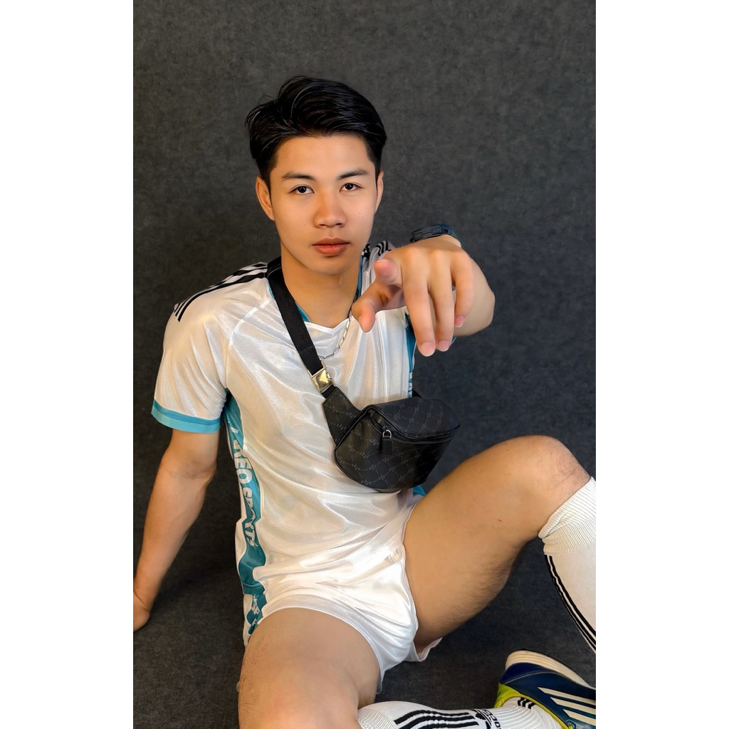 เสื้อ_jAreo_มันเงาบาง_สีขาว_แถบเขียวทะเล