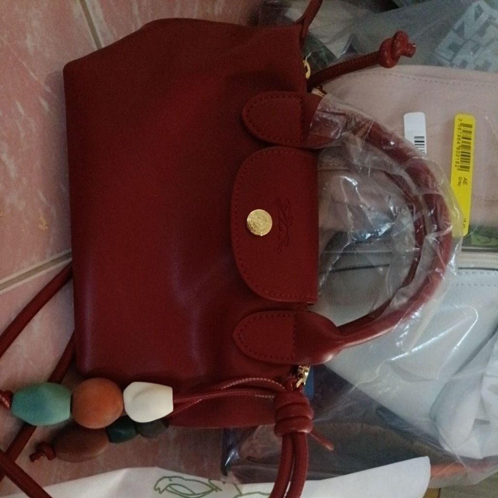 กระเป๋าแบรนด์แท้ LONGCHAMP มือ 1 ราคาถูก