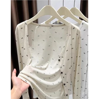 เสื้อคาร์ดิแกนถักแขนยาวพิมพ์ลายโบว์ สไตล์ฤดูร้อนพร้อมคุณสมบัติป้องกันแสงแดด เหมาะสำหรับฤดูร้อน เนื้อผ้าใส่สบาย ทรงหลวม