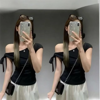 เสื้อปาดไหล่ทรงเสน่ห์ แต่งโบว์ระบายพริ้ว เสกลุคสวยหรูดุจเจ้าหญิง