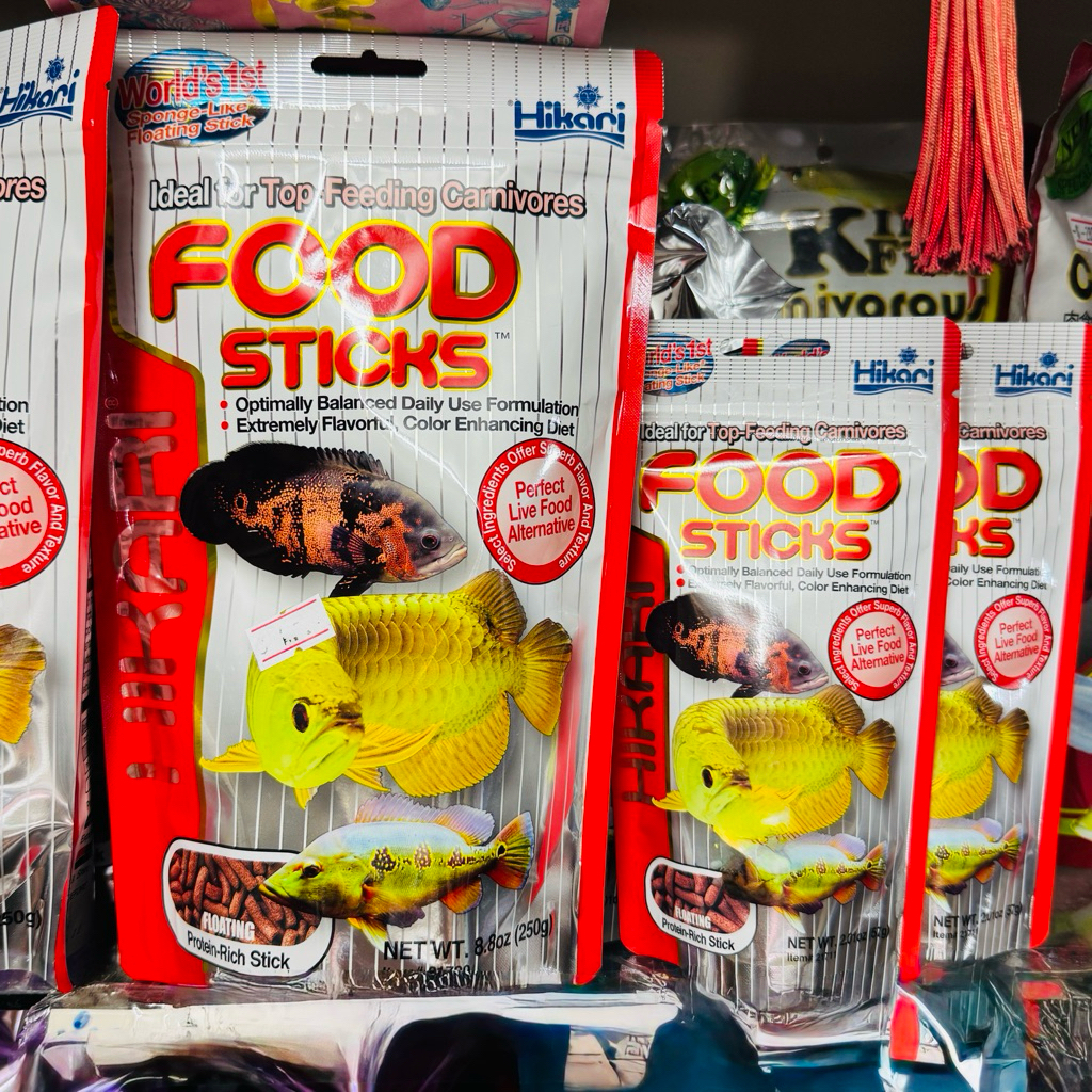 Hikari food sticksอาหารปลาชนิดลอยน้ำ สำหรับอโรวาน่า และปลากินเนื้อทุกชนิด