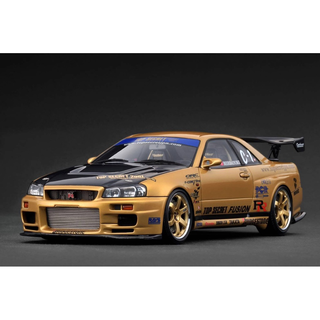 TOP SECRET 34GTR (BNR34) GOLD 1:18 [IG3847]