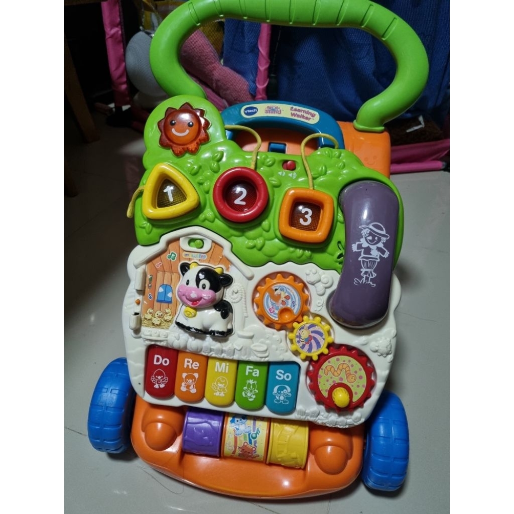 VTech รถหัดเดินเด็ก Sit-to-Stand สีส้ม พร้อมแผงกิจกรรมเรียนรู้