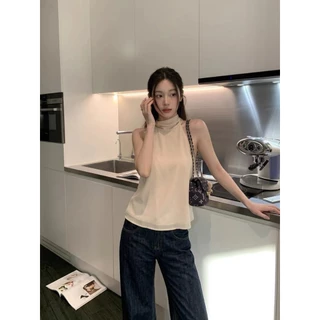 (พร้อมส่ง) เสื้อแขนกุดผูกโบว์หลัง - 10090 TAG WG.WE 🇰🇷