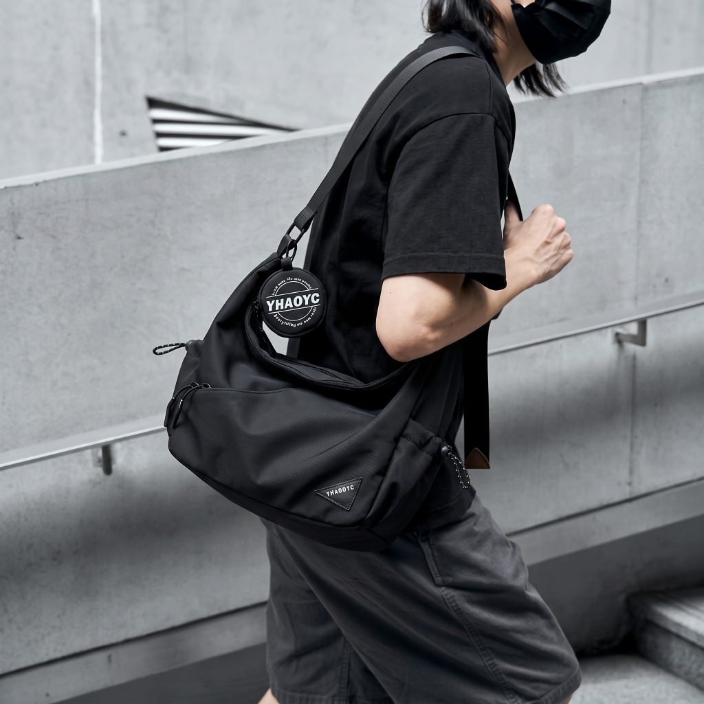 กระเป๋าสะพายข้างผู้ชายทรงใหญ่กันน้ำใส่ของเยอะเหมาะทำงานเดินทางเมืองและกระเป๋าสะพายเดินทางกลางแจ้งน้ำหนักเบา