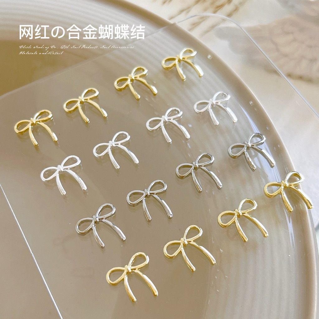 อะไหล่ติดเล็บ เครื่องประดับรูปโบว์ งานจริงน่ารักมาก 50ชิ้น/ห่อ สินค้าพร้อมส่ง