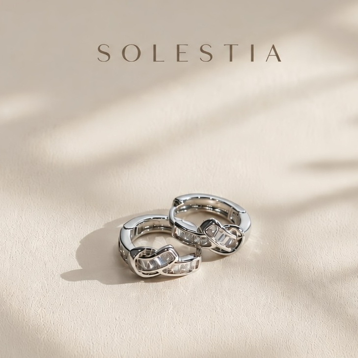 Solestia.th : Astra Knot ต่างหูดีไซน์ทรงปมถักไขว้