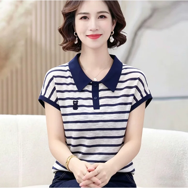 เสื้อโปโลแขนสั้นสำหรับผู้หญิง: เสื้อสไตล์มินิมอลที่ดูดีและสวมใส่ได้หลากหลายโอกาส โดดเด่นด้วยดีไซน์แถบสีแบบ Color-block ท