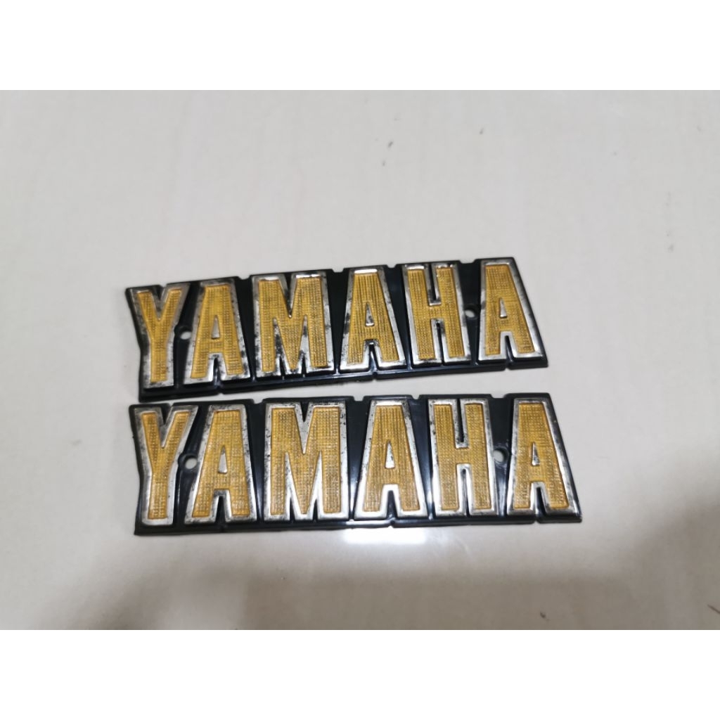 โลโก้​ข้าง​ถัง​ YAMAHA​ RX100...