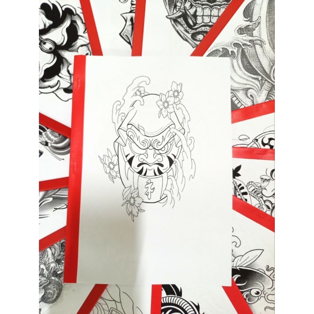 แบบสักลายดารุมะ 20 แผ่น คละแบบพร้อมเข้าเล่ม