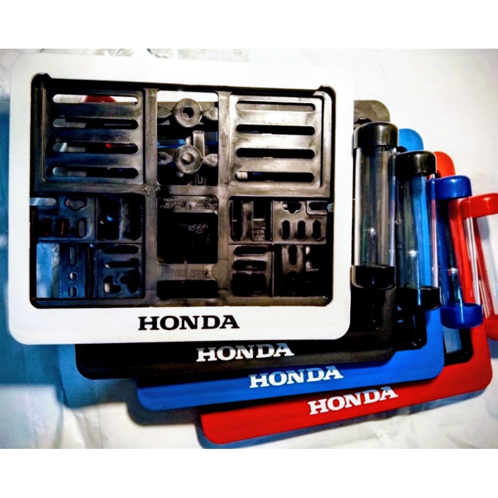 NEW!!กรอบใส่ป้ายทะเบียนมอเตอร์ไซด์พลาสติก HONDA NEW!!แบบมีแผ่นใส และ แบบไม่มีแผ่นใส
