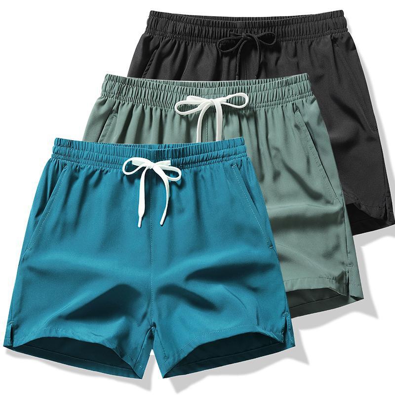 กางเกงกีฬาขาสั้นสำหรับผู้ชายและผู้หญิง ยืดหยุ่นเล็กน้อย แห้งเร็ว เย็นสบาย เหมาะสำหรับออกกำลังกายและจ็อกกิ้ง