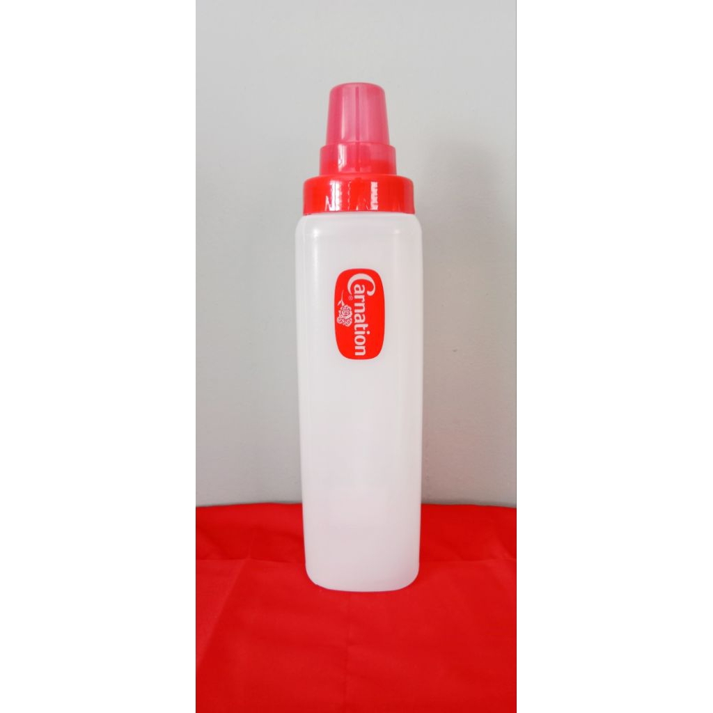 ขวดบีบคาร์เนชั่น ขนาด 1000 ml ขวดบีบนม ขวดบีบซอส ขวดบีบมายองเนส มีสเกล  ขนาด กว้าง 7.5 cm  สูง 30 cm  พลาสติก Food Grade