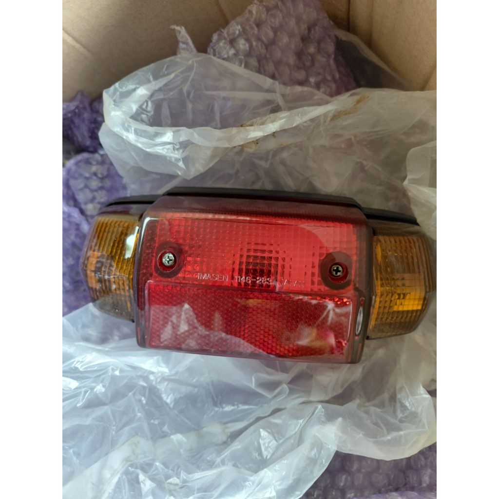 2XF-H4710-V0-00ไฟท้ายBELLE100/BELLE-R,Y100 แท้ งานรุ่นนำเข้าจากยี่ปุ่น IMASEN JAPAN