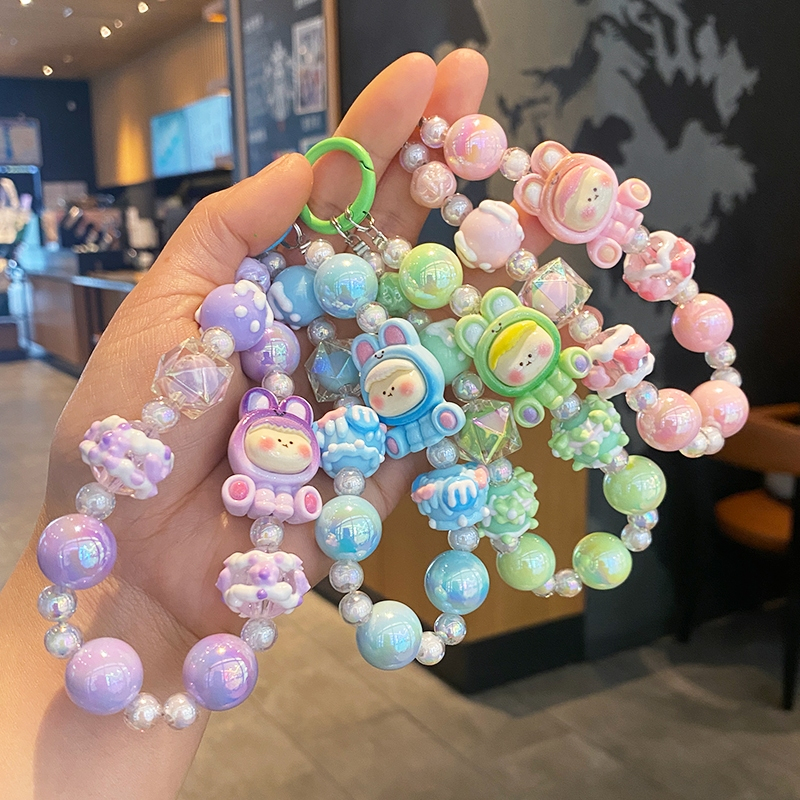 ห่วงโซ่โทรศัพท์อินเทรนด์น่ารักคริสตัลตุ๊กตาสายคล้องโทรศัพท์มือถือการ์ตูนมือวาดลูกปัดโทรศัพท์โซ่น่ารักโทรศัพท์จี้จี้กระเป