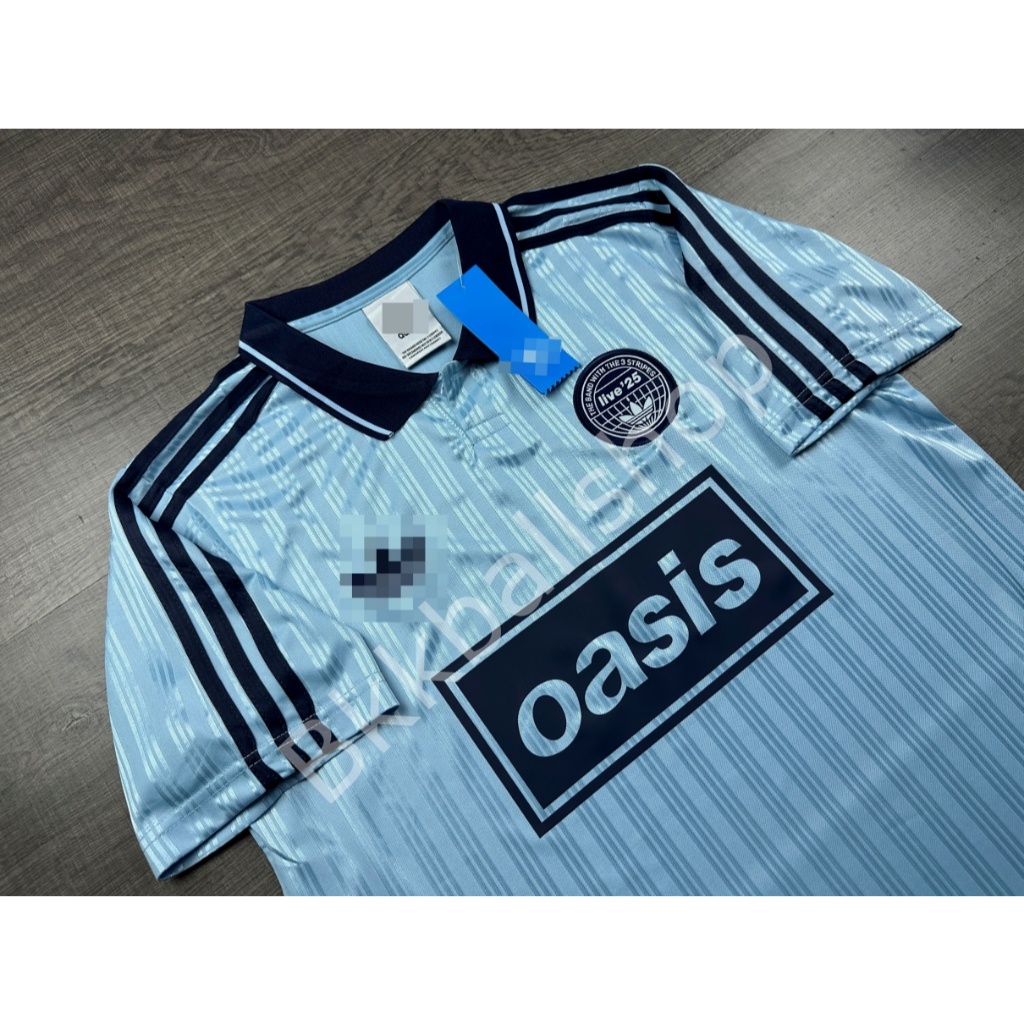 [แฟนบอล] - เสื้อโปโล Oasis โอเอซิส สีฟ้า Live 2025