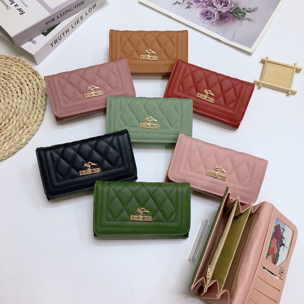 ZZ13#กระเป๋าธนบัตรใบกลางรุ่น2พับ รายละเอียดสินค้า วัสุดหลัก : หนังpu ขนาดกระเป๋า : สูง 8.5 * กว้าง 13.5 CM.