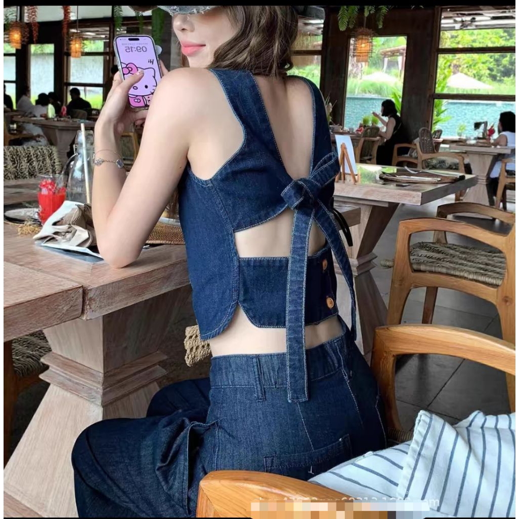 ชุดเซ็ทยีนส์  2 ชื้น สไตล์อเมริกัน เสื้อกั๊กยีนส์ไซน์เปิดหลังผูกเชือกทรงเข้ารูป+กางเกงขายาวทรงขากว้างใส่แล้วดูแซ่บ เท่