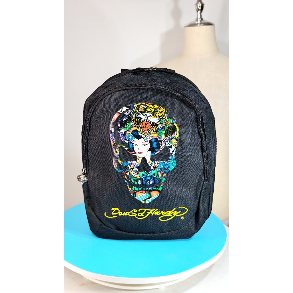 กระเป๋าเป้ Ed Hardy สไตล์สตรีท ลายหัวกะโหลกสีสันสดใส จุของได้เยอะ น้ำหนักเบา ใช้งานได้ทั้งผู้ชายและผ
