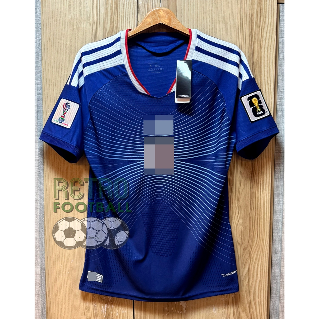 เสื้อกีฬาฟุตบอลโลก ทีมชาติ ญี่ปุ่u PLAYER เกรดนักเตะ Home ชุดเหย้า ปี 2026 ฟลูออฟชั่นชื่อเบอร์นักเตะในทีม (ครบทุกคน)