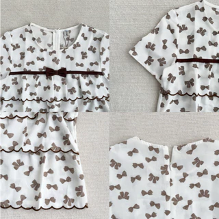 Glucoat | [A322/A867] เสื้อพิมพ์ลายโบว์สีชมพู/สีน้ำตาล คอกลม แต่งโบว์กลางอก ระบายสองชั้น ซิปหลังยาว