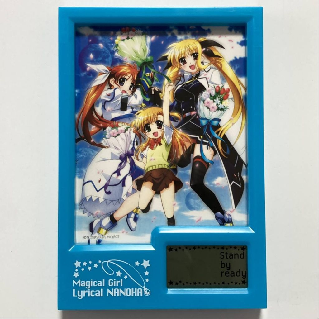 [พร้อมส่ง / ของแท้ 💯%] นาฬิกาตั้งโต๊ะกรอบรูป Photo Stand Clock - Magical Girl Lyrical NANOHA (ของแถม