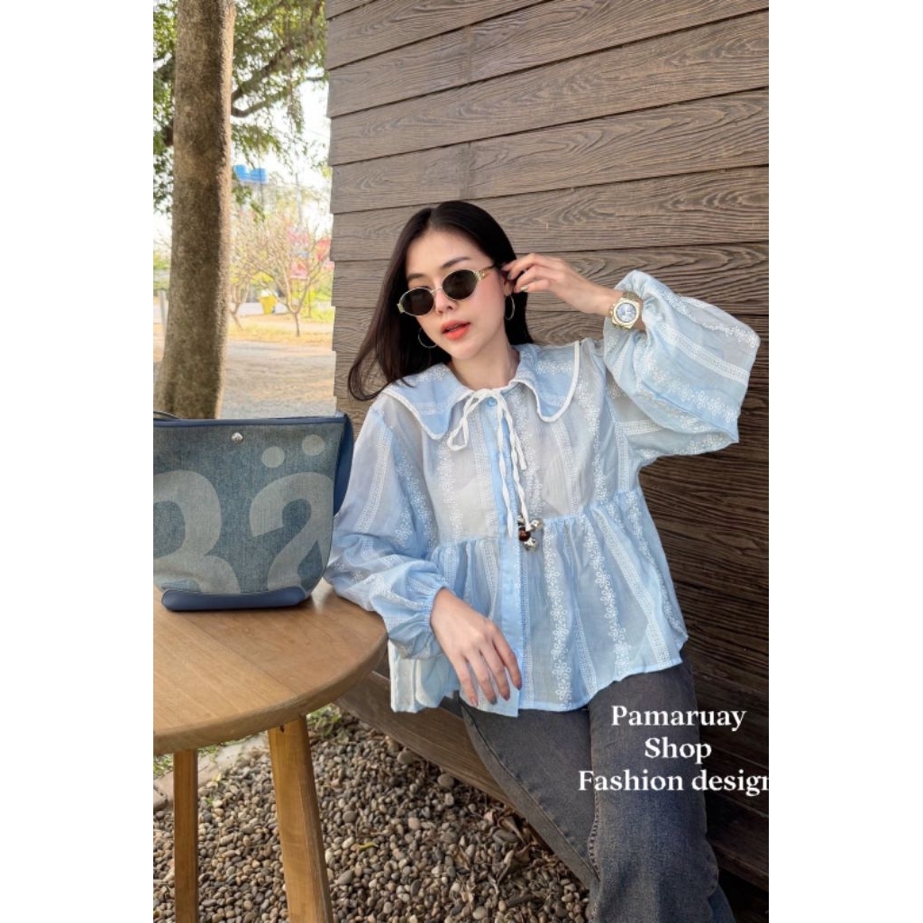 Cotton เสื้อคอบัวแขนยาวแต่งโบว์ผ้าโรซี่พิมพ์ลาย