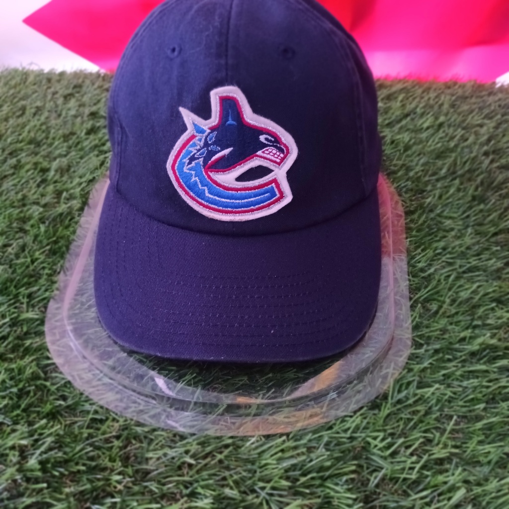 NHL Vancouver Canucks ice hockey cap. American Needle Merchandise. adjustable size. rate 8.8. full e