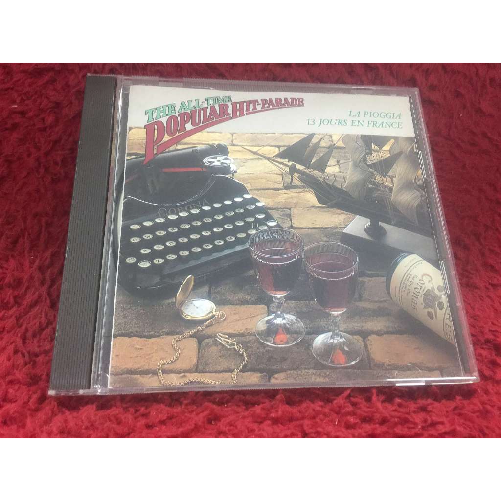 CD THE ALL-TIME POPULAR HIT-PARADE - LA PIOGGIA 13 JOURS EN FRANCE สภาพตามรูปปก ZA135-90