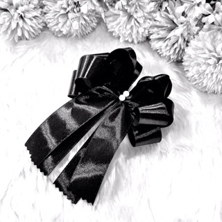 โบว์ผ้าสีดำโบวผูกของ แสดงความไว้อาลัย ไว้ทุกข์