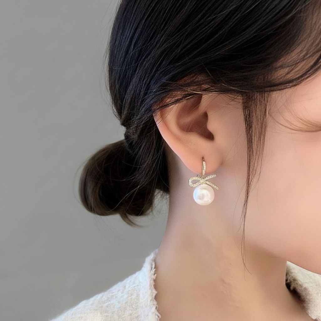 ESCOBAL ต่างหูไข่มุก Pearl Bow ต่างหูไข่มุก ต่างหูเงินแท้ฝังเพขร ตุ้มหูไข่มุกขาว Valentine ของขวัญ ราคา ถูกที่สุด ดีลบีเคเค แกลเลอรีภาพที่ 2