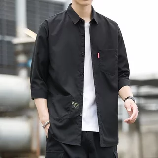 เสื้อเชิ้ตสีทึบของผู้ชายผ้านุ่ม และสบายโดยไม่ต้องรีดผ้าเสื้อเชิ้ตผู้ชายของเกาหลีเสื้อเชิ้ตฮาวายวันสงกราะห์