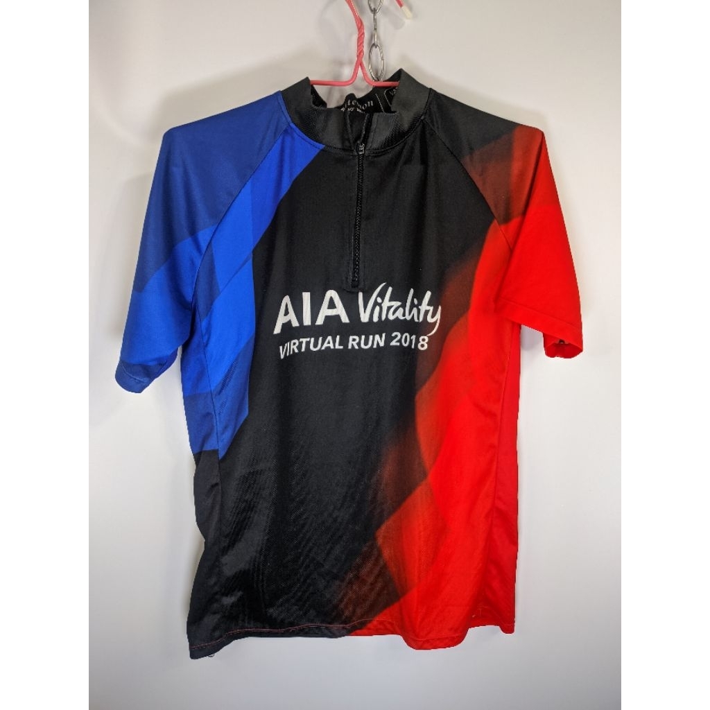 เสื้อปั่นจักรยานAIA มือสอง อก38