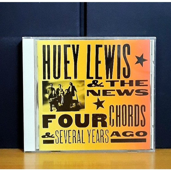 CD ซีดีเพลงสากล / Huey Lewis & The News / Four chords & several years ago                        -a2
