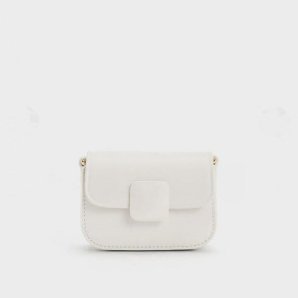 SALE 50% Micro Koa Crossbody Bag กระเป๋าสะพาย Crossbody ใบจิ๋ว สี Cream จาก Charles and Keith (ของแท้นำเข้าจากสิงคโปร์)