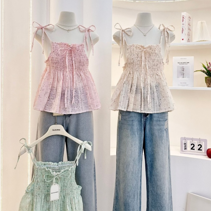KN.Clothes เสื้อสายเดี่ยวผูกไหล่ เว้าข้าง สม็อคหน้าอก แต่งโบว์ ผ้าปักดอกไม้ Pee Ka Nong