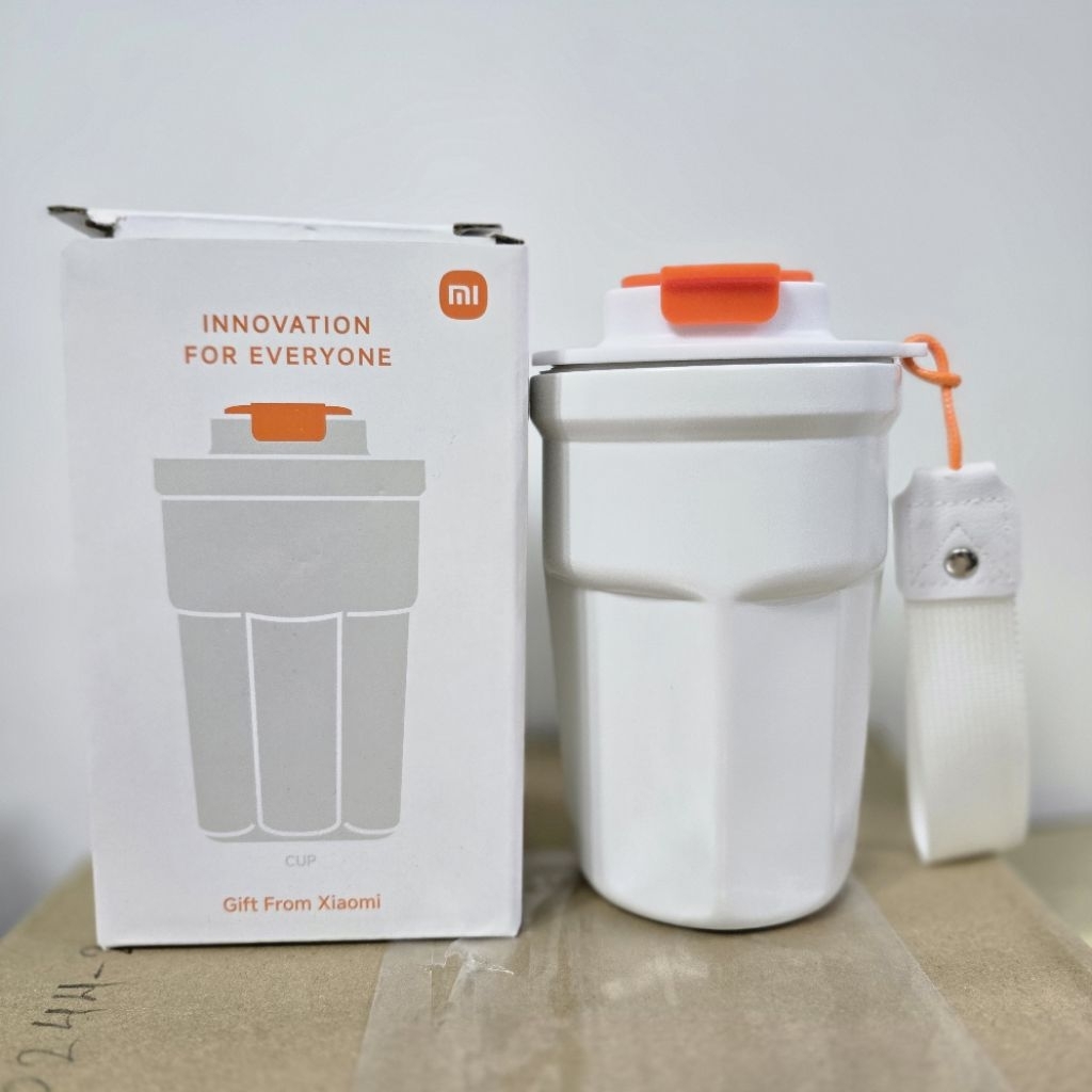 สินค้าพรีเมี่ยมแก้วน้ำแสตนเลส xiaomi สีขาวตัดส้ม